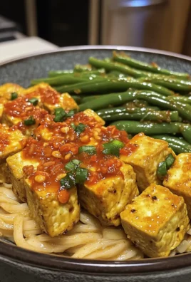 Deliciously Amazing Crispy Tofu Bowls with Curry Noodles and Chili Green Beans